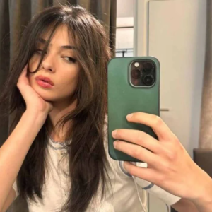 Deva Cassel, daughter of Monica Bellucci, lights up the catwalk in a gold dress at Fashion Week