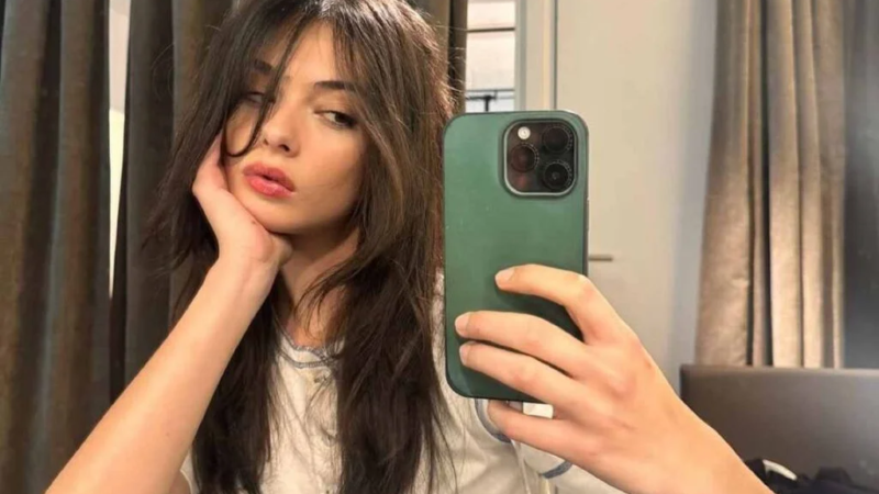 Deva Cassel, daughter of Monica Bellucci, lights up the catwalk in a gold dress at Fashion Week