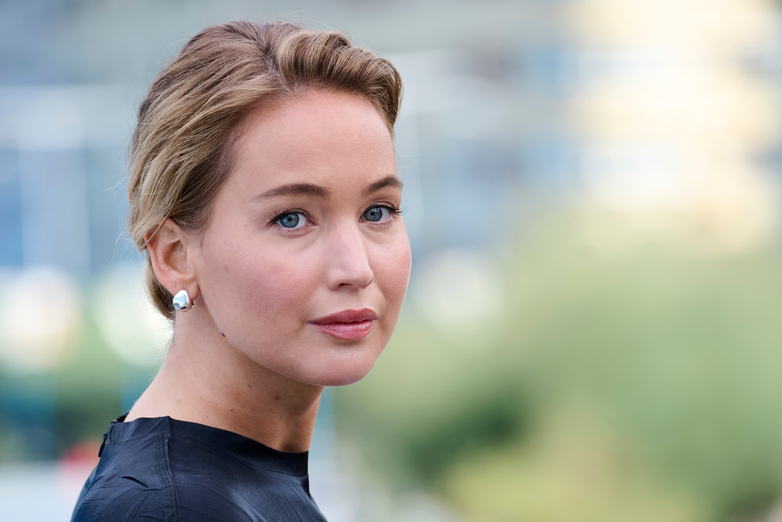 Jennifer Lawrence Has a Novel Swap for a Travel Bag: a $3,450 Dior Book Tote